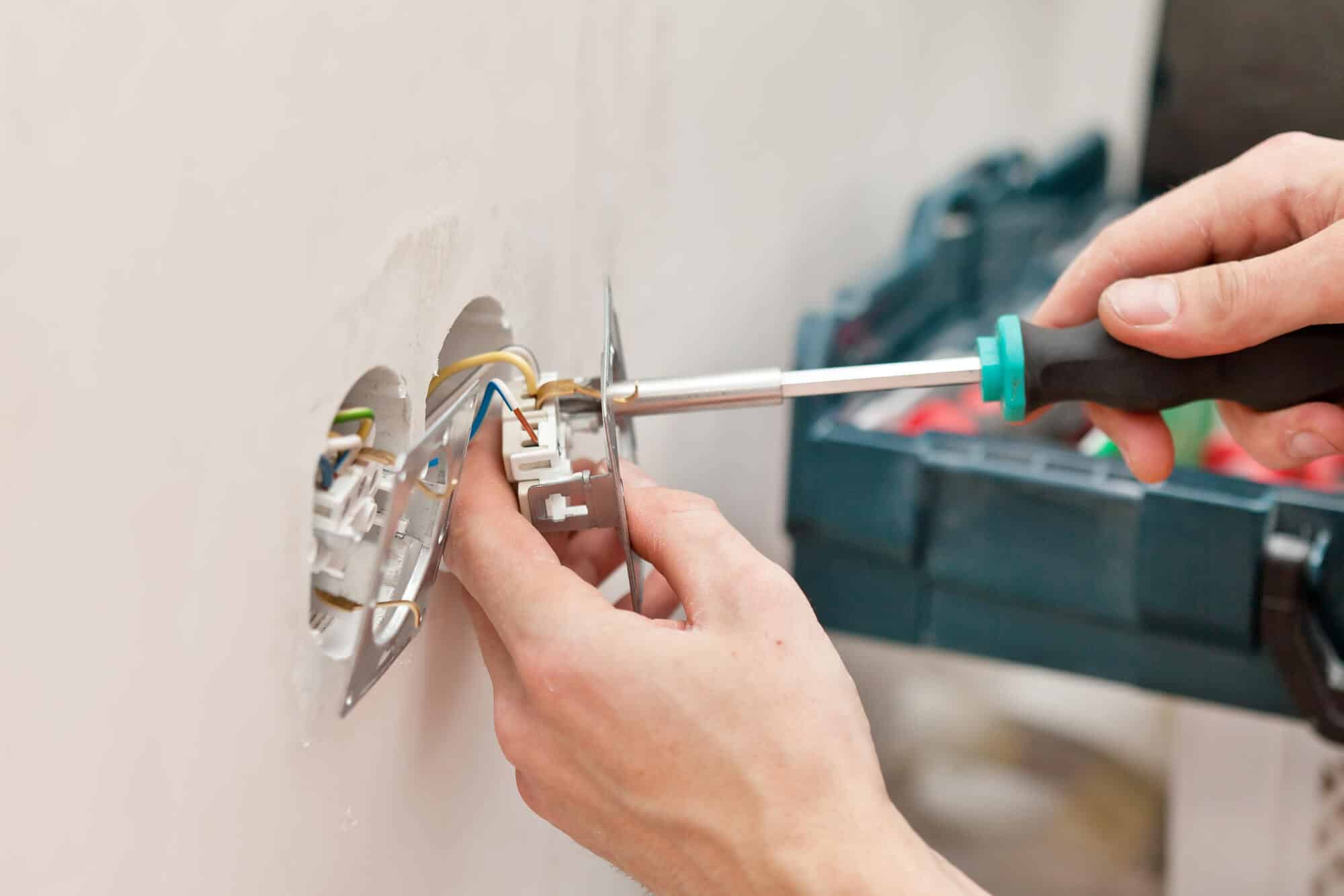 installing outlet on wall