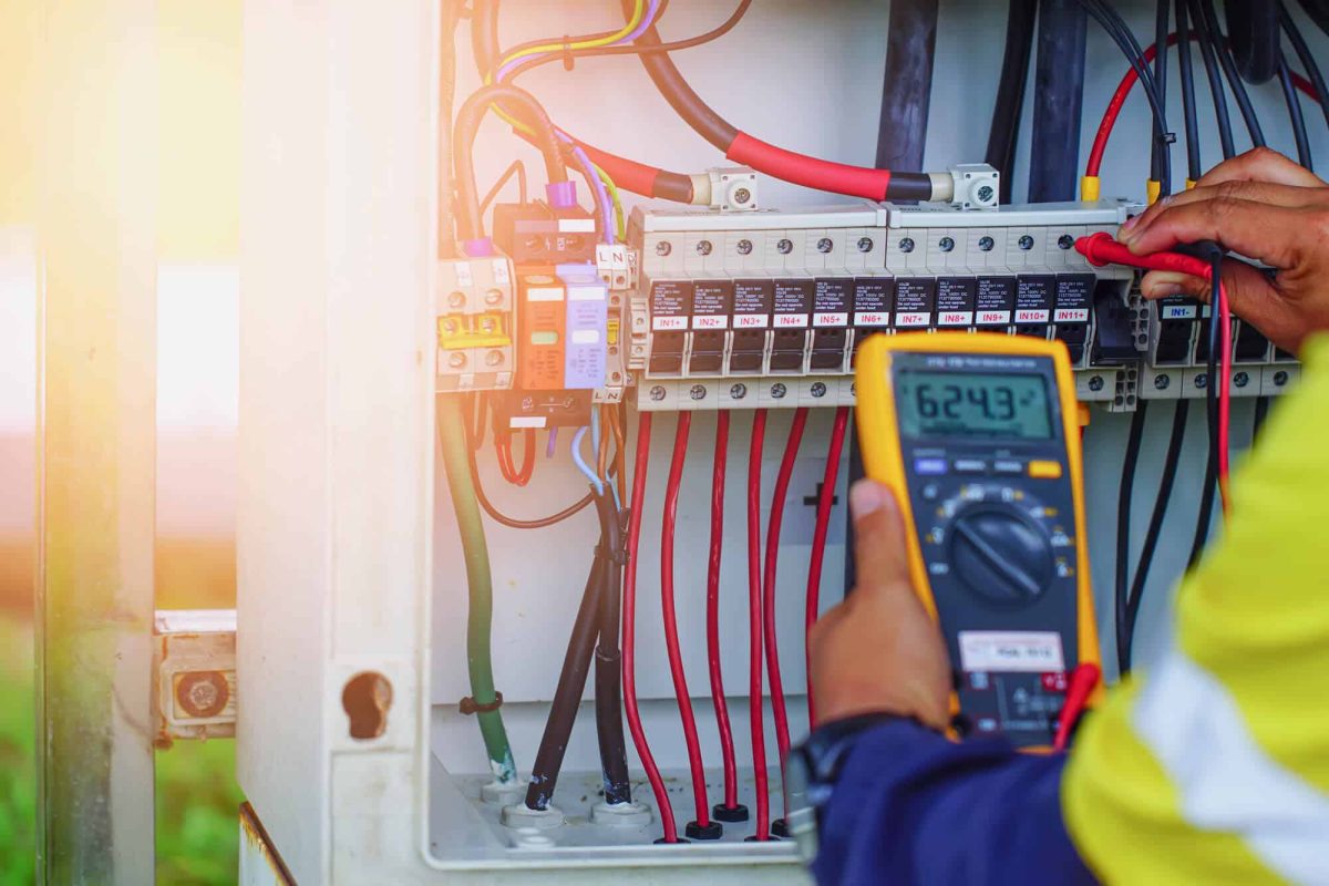 electrician working on a panel